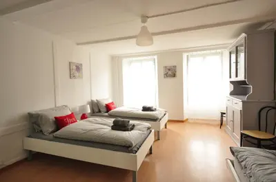 Ein Bett oder Betten in einem Zimmer der Unterkunft Townhouse II Sleeps 12 guests Central