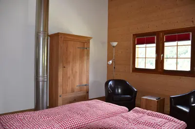 Ein Bett oder Betten in einem Zimmer der Unterkunft B&B Hängebrigga