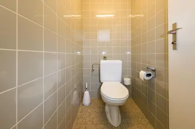 Ein Badezimmer in der Unterkunft Postgebäude