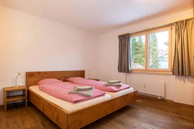 Ein Bett oder Betten in einem Zimmer der Unterkunft Ferienwohnung Titschermatte