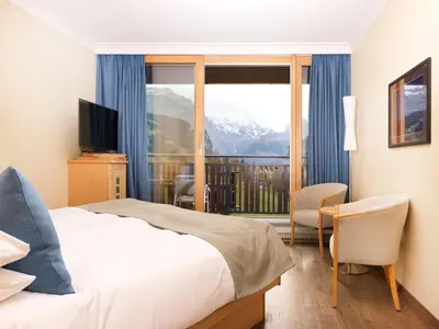 Ein Bett oder Betten in einem Zimmer der Unterkunft Beausite Park Hotel & Spa