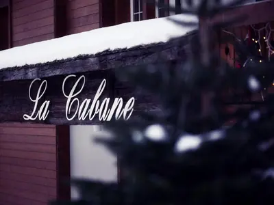 Ein Zertifikat, Auszeichnung, Logo oder anderes Dokument, das in der Unterkunft Boutique Hotel La Cabane ausgestellt ist