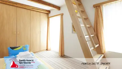 Ein Bett oder Betten in einem Zimmer der Unterkunft Family Hotel Desirée