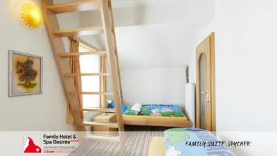 Ein Bett oder Betten in einem Zimmer der Unterkunft Family Hotel Desirée