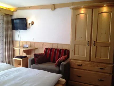 Ein Bett oder Betten in einem Zimmer der Unterkunft Hotel City