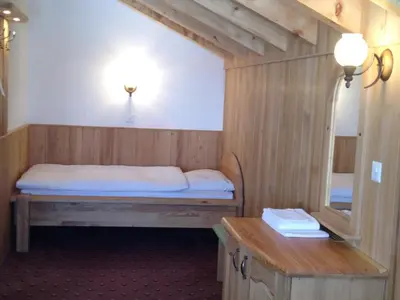 Ein Bett oder Betten in einem Zimmer der Unterkunft Hotel City