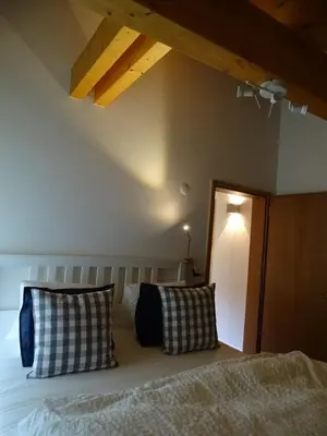Ein Bett oder Betten in einem Zimmer der Unterkunft Ferienhaus Grüner Heinrich