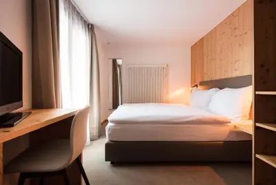 Ein Bett oder Betten in einem Zimmer der Unterkunft Hotel Continental