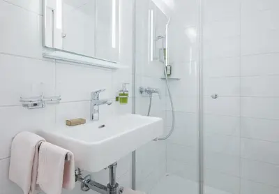 Ein Badezimmer in der Unterkunft Hotel Continental