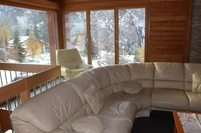 Ein Sitzbereich in der Unterkunft Chalet du Chef