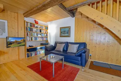 Ein Sitzbereich in der Unterkunft Chalet Tuk-Tuk