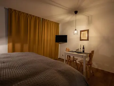Ein Bett oder Betten in einem Zimmer der Unterkunft Malteserhaus Zermatt