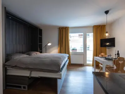 Ein Bett oder Betten in einem Zimmer der Unterkunft Malteserhaus Zermatt