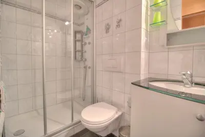 Ein Badezimmer in der Unterkunft Aramis 1