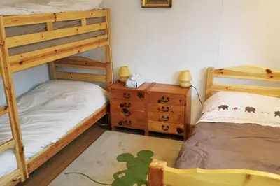 Ein Bett oder Betten in einem Zimmer der Unterkunft Apartment in Crans Montana Town Centre Mountain View