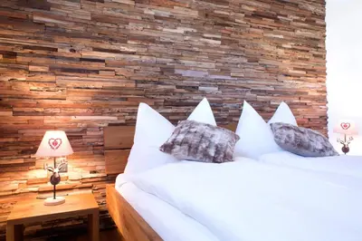 Ein Bett oder Betten in einem Zimmer der Unterkunft Apartment Olympia Mischabel