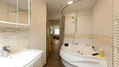 Ein Badezimmer in der Unterkunft Apartment Olympia Mischabel