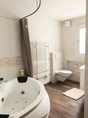 Ein Badezimmer in der Unterkunft Apartment Olympia Mischabel