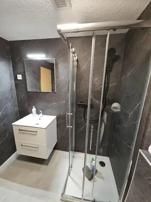 Ein Badezimmer in der Unterkunft Chalet Graben - Aare Jungfrau AG