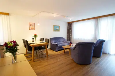 Ein Sitzbereich in der Unterkunft Bolero Appartements