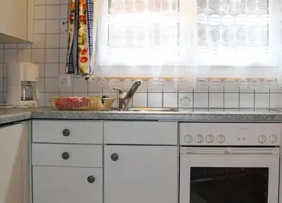 Küche/Küchenzeile in der Unterkunft Chalet Alpentraum, alte Gasse 20