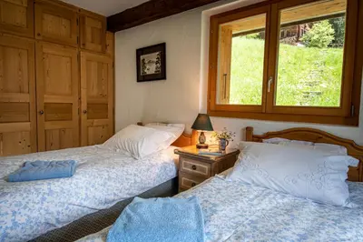 Ein Bett oder Betten in einem Zimmer der Unterkunft Chalet Grouse