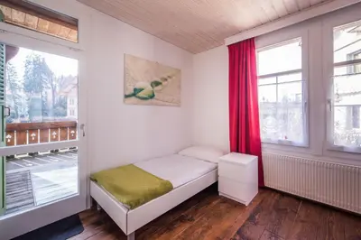 Ein Bett oder Betten in einem Zimmer der Unterkunft Chalet Cecile