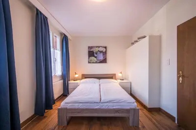 Ein Bett oder Betten in einem Zimmer der Unterkunft Chalet Cecile