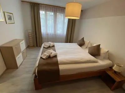 Ein Bett oder Betten in einem Zimmer der Unterkunft Chalet Pfingsteggblick