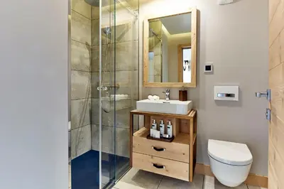 Ein Badezimmer in der Unterkunft Chandolin Boutique Hotel