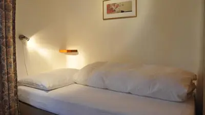 Ein Bett oder Betten in einem Zimmer der Unterkunft Chalet Goldblick