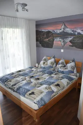 Ein Bett oder Betten in einem Zimmer der Unterkunft Panoramachalet