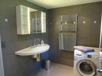 Ein Badezimmer in der Unterkunft Holiday Home Chalet Aaregg by Interhome