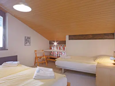 Ein Bett oder Betten in einem Zimmer der Unterkunft Apartment Im Gruebi Apt- 10 by Interhome