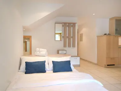 Ein Bett oder Betten in einem Zimmer der Unterkunft Apartment La Prairie by Interhome