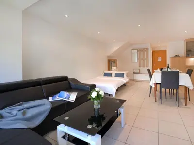 Ein Sitzbereich in der Unterkunft Apartment La Prairie by Interhome