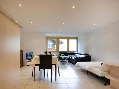 Ein Bett oder Betten in einem Zimmer der Unterkunft Apartment La Prairie by Interhome