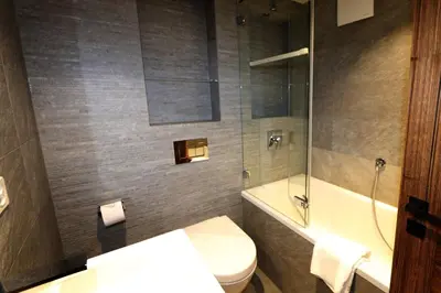 Ein Badezimmer in der Unterkunft Heinrida