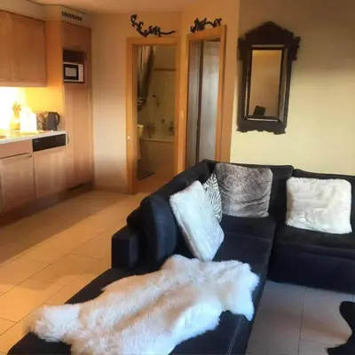 Ein Sitzbereich in der Unterkunft Apartment with Garden Daltons 1