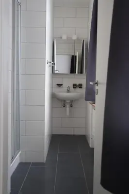 Ein Badezimmer in der Unterkunft Swiss Holidays-City Apartments Interlaken