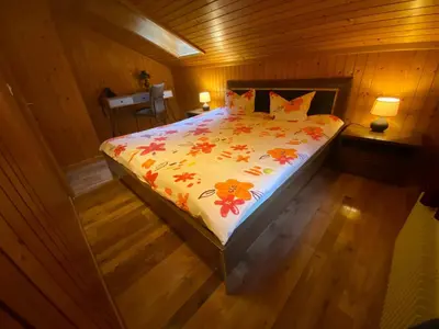 Ein Bett oder Betten in einem Zimmer der Unterkunft Chalet Burglauenen Grindelwald