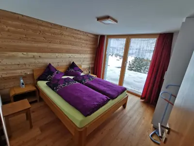 Ein Bett oder Betten in einem Zimmer der Unterkunft Chalet Enzian