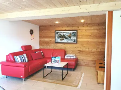 Ein Sitzbereich in der Unterkunft Chalet Enzian