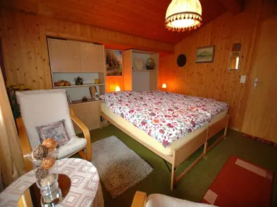 Ein Bett oder Betten in einem Zimmer der Unterkunft Chalet in Wilderswil with Jungfrau Views
