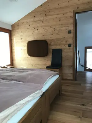 Ein Bett oder Betten in einem Zimmer der Unterkunft Ferienwohnung Ursis Stall
