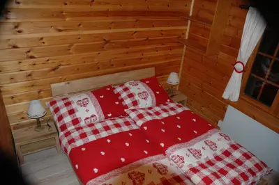 Ein Bett oder Betten in einem Zimmer der Unterkunft Chalet le Verger