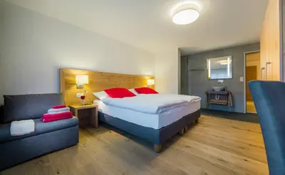 Ein Bett oder Betten in einem Zimmer der Unterkunft Apartment Riffelberg