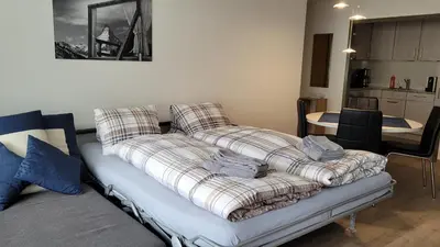 Ein Bett oder Betten in einem Zimmer der Unterkunft Viktoria B (J)