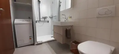 Ein Badezimmer in der Unterkunft Viktoria B (J)