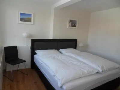 Ein Bett oder Betten in einem Zimmer der Unterkunft Apartment Silverpeak by Silberhorn Hotel